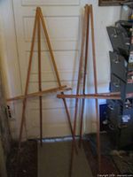 Both wooden easels standing
