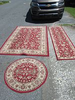 All three rugs laid out: rectangular, runner, round
