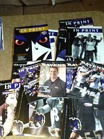 Group of Baltimore Ravens In Print magazines spread on table, various covers visible