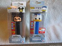Front view boxed Mickey and Donald Pop! PEZ dispensers