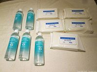 All items: five sanitizer bottles, five wipe packs