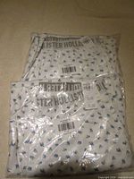 Two sealed Hollister pajama pants packages stacked