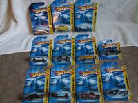 Group shot showing 10 of the 11 blister-carded Hot Wheels cars
