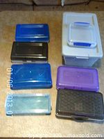 All eight plastic storage containers grouped