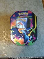 Tin closed showing Pokémon artwork