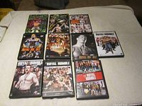 Overhead of 10 WWE DVD cases