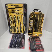 All four sealed tool sets displayed together