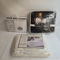 All three packaged bedding sets front view