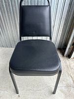 Front view showing full chair, upholstery and frame