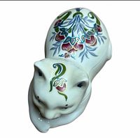 Top view of porcelain cat with floral painting