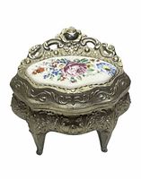 Full view of ornate silver-tone trinket box