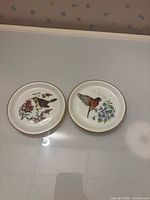 Pair of porcelain trinket dishes side by side