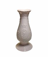 Front view of light pink embossed porcelain vase