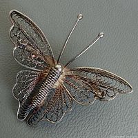 Front view of sterling filigree butterfly brooch