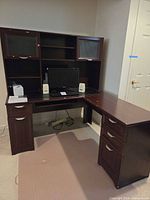 Full view of L-shaped desk with hutch assembled