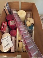 Box contents overview showing variety of candles