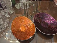 Top view of both enamel bowls on stands showing colors and form