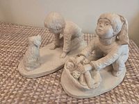 Both statues side by side showing overall design