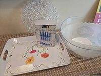 All items grouped: tray, platter, two bowls, boxed Tovolo mold set