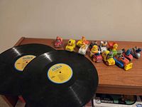 Overview of two LPs and group of toy vehicles