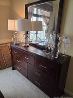 Front view of dresser with mirror attached, shows overall style and finish