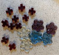 Group shot of all 16 glass pieces on carpet