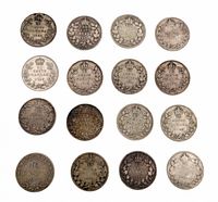 Group shot of all coins obverse with wreath design