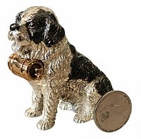 Front view of 800 silver enamel St. Bernard figurine with coin for scale