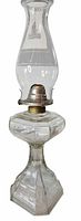 Full lamp front view showing chimney, burner, glass body