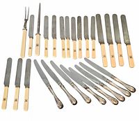 All 26 pieces laid out; Birks knives, ivorine-handled dinner and dessert knives, carving fork, sharpening steel visible.