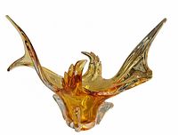 overall view of amber freeform glass centerpiece showing shape