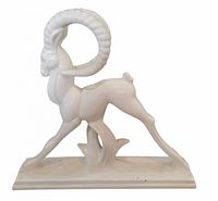 front view of white glazed gazelle candle holder showing overall form
