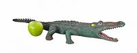 Full side view of Imperial rubber crocodile beside apple for scale
