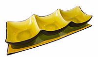 Top view of assembled relish set showing yellow compartments and black rims