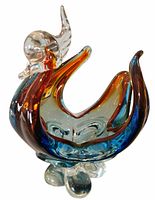 Front three-quarter view showing swan form and colour transitions