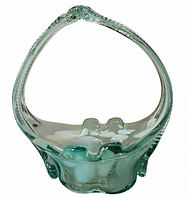 Full view of sea-green and white art glass basket with arched handle