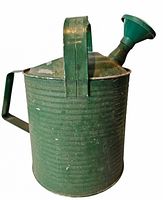 Full side profile showing ribbed body, top and side handles, spout without rose attached