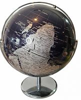 Front view of black and silver desktop globe on chrome base