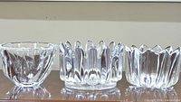 Front view of all three Orrefors crystal bowls