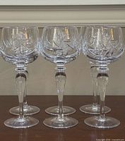 Group shot of six Ajka Csopak cut crystal wine glasses