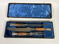 Open case showing all three utensils and interior lining