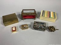 Group shot of all seven trinket boxes