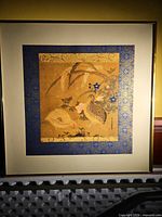 Framed artwork front view showing entire composition and frame