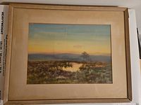 Front view of framed landscape print showing image, mat and frame