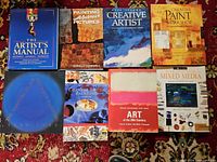 All eight hardcover art instruction books laid out together