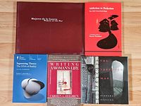 Group shot of five books showing titles and formats
