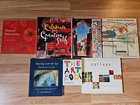 All seven book covers laid out on floor