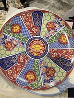 Top view of the entire decorative plate showing full pattern and colors
