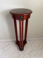 Full view round top pedestal mahogany finish