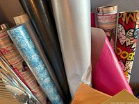 Assorted patterned gift-wrap rolls